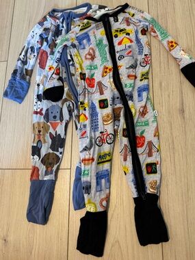 Two Posh Peanut Onesies dog print and NYC print